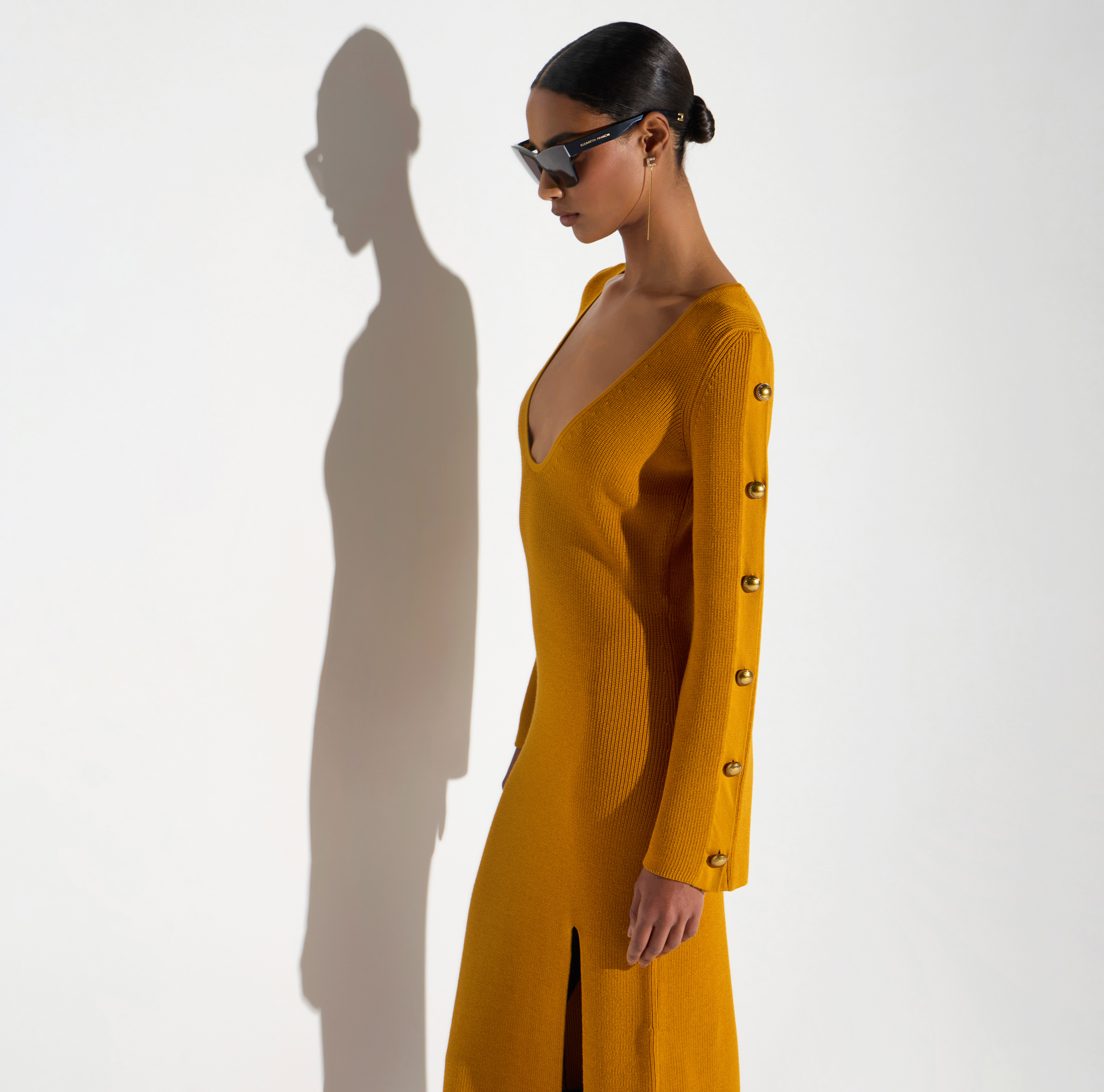 elisabetta franchi double breasted knit dress with jewel buttons The dress features ¾