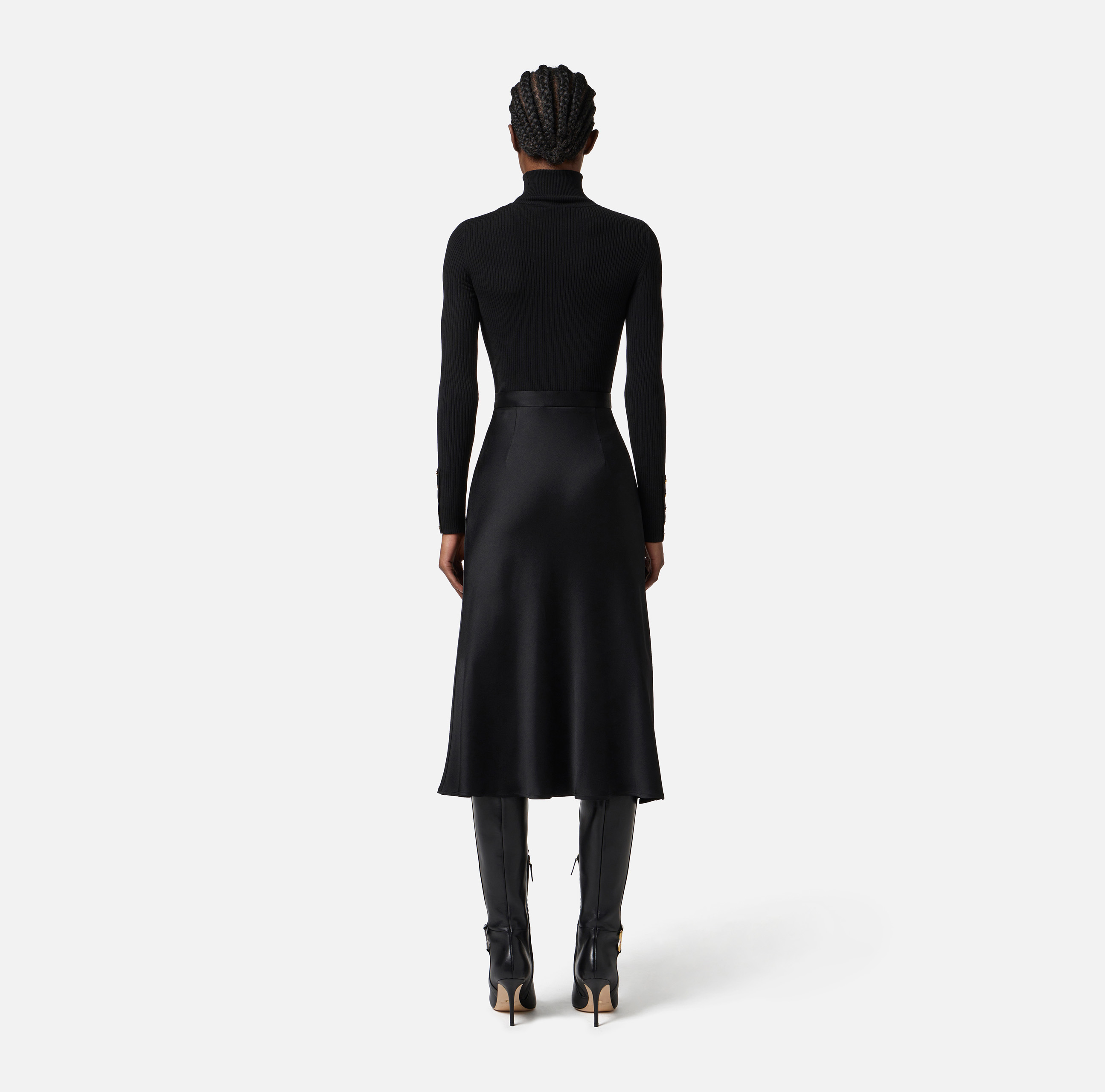 Dress in ribbed knit and satin fabrics with pocket