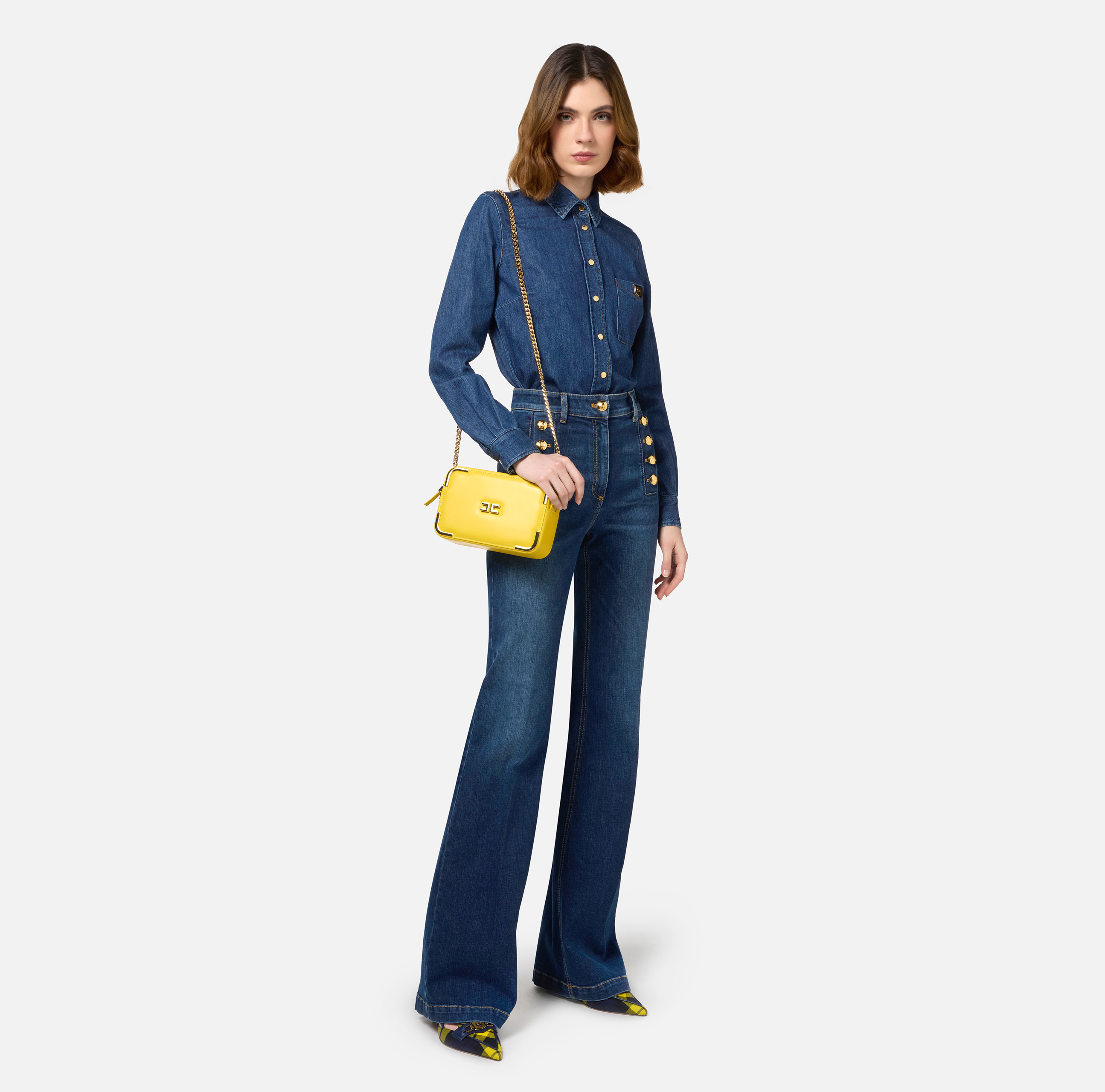 Bell-bottom stretch cotton jeans with side button placket
