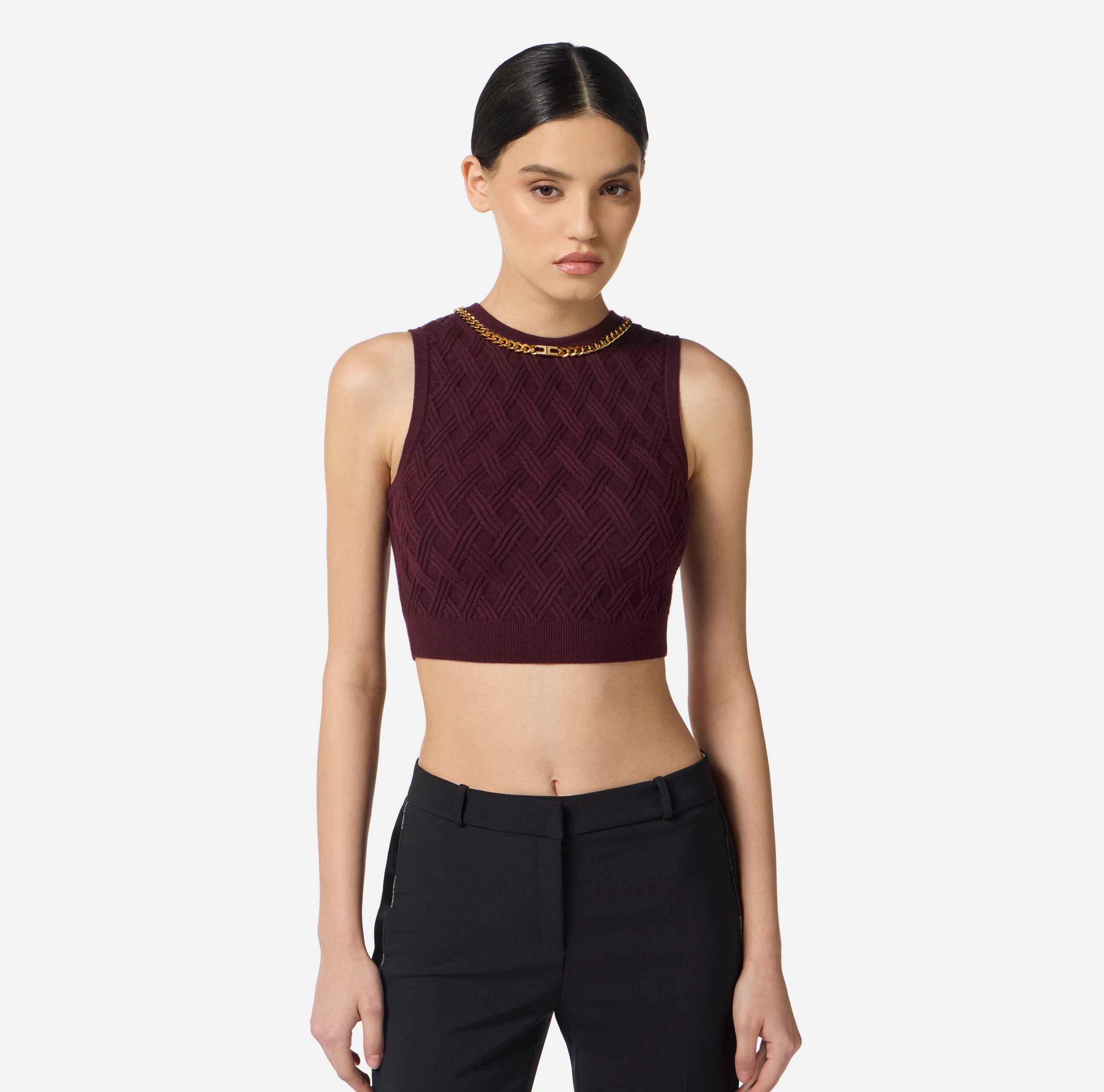 Top in knit fabric with diamond pattern and jewel details