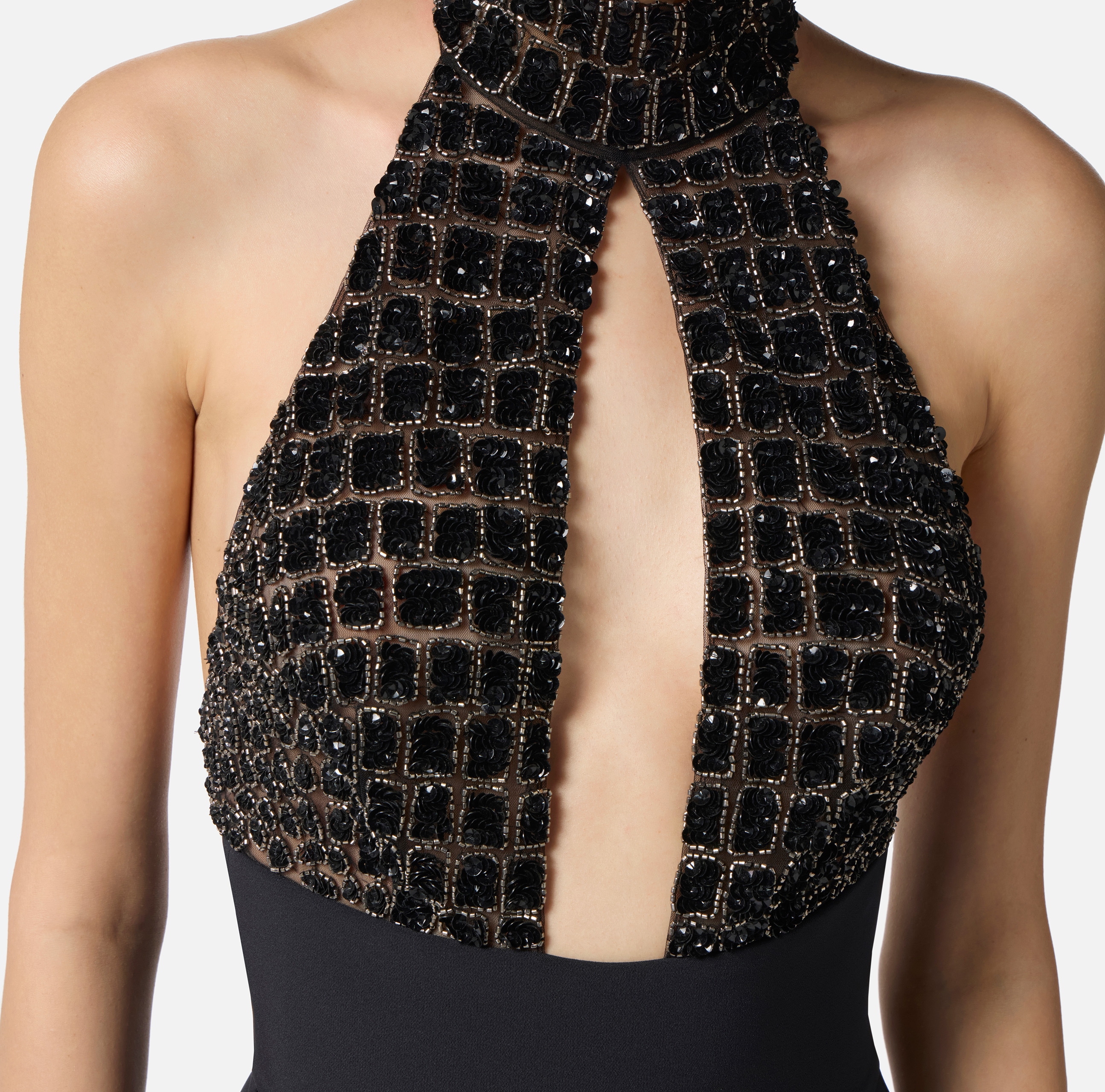 Jumpsuit in tulle and crêpe fabrics with crocodile Jumpsuit in tulle and crêpe fabrics with crocodile