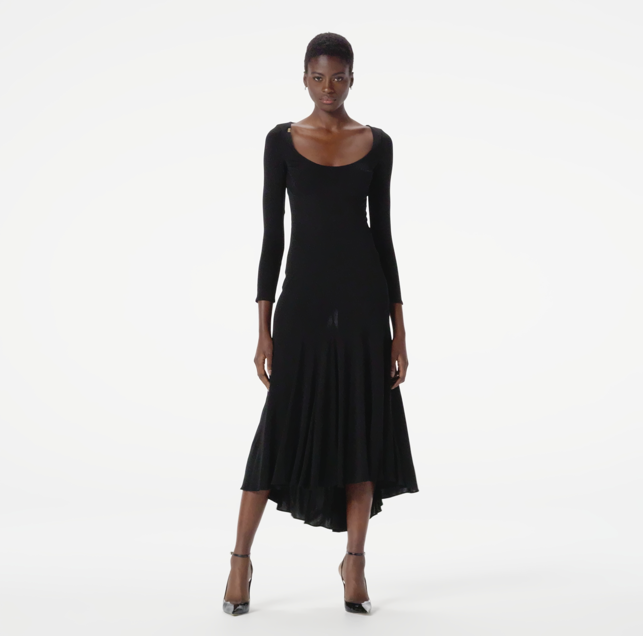 Dress in lightweight jersey fabric with asymmetric cuts